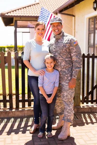Military family standing together