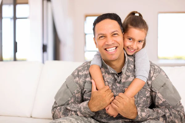 Daughter and military father
