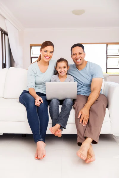 Family using laptop computer