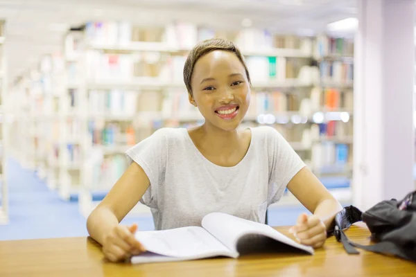 College girl studying in library