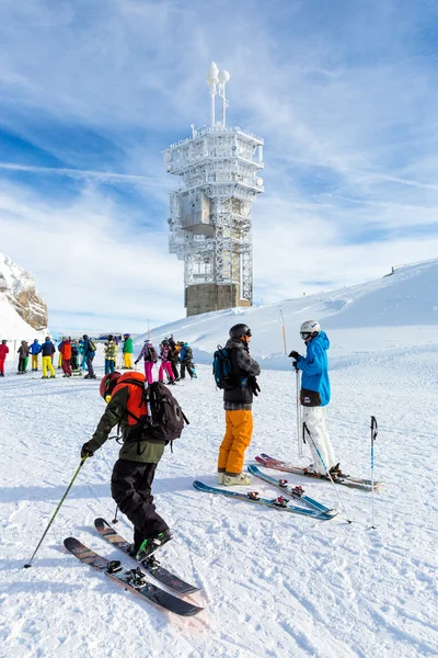 Skiers preparing for a downhill run from the top of Mount Titlis at minus 12 degrees Celcius.