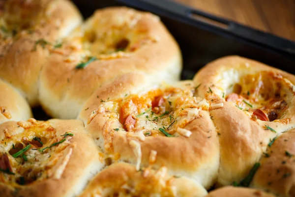 Mini pizzas baked stuffed with cheese