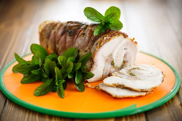 Pork baked with spices and mint