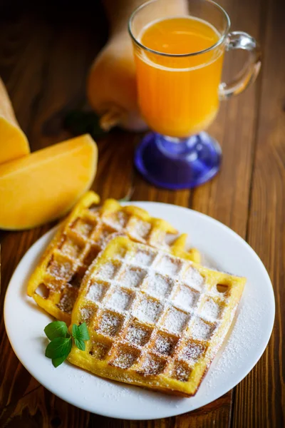 Sweet pumpkin waffles on the plate