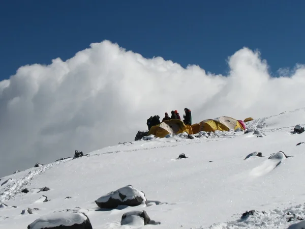 Tents under snow in the camp, Andes