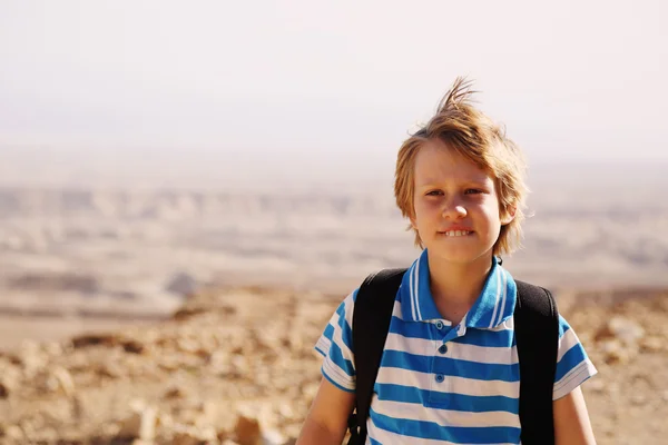 Boy hiking in the desert