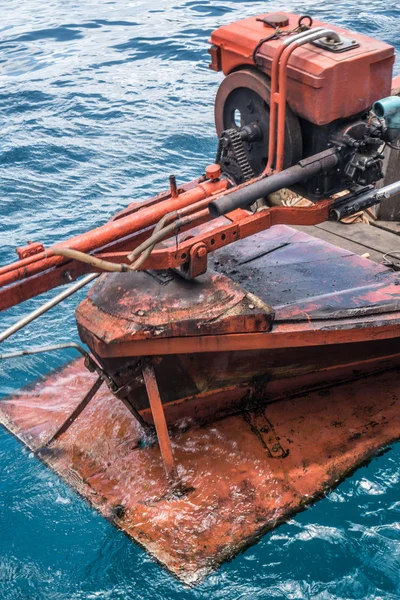 Engine and part of the propeller of long-tailed boat