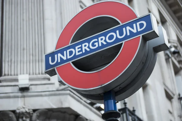 Sign of underground transit system in London, UK