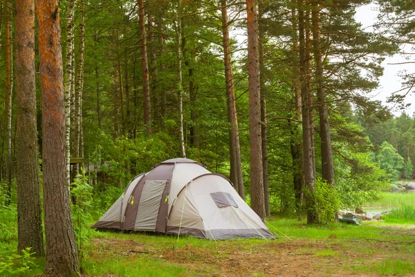 Camping tent in wooded campsite. Hamina, Finland, Suomi