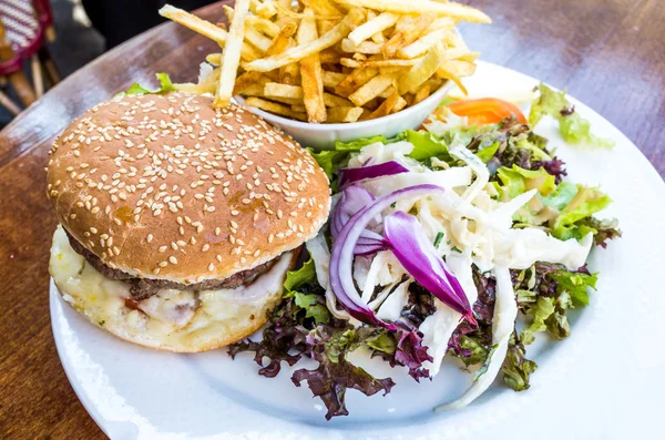 American cheese burger with Golden French fries