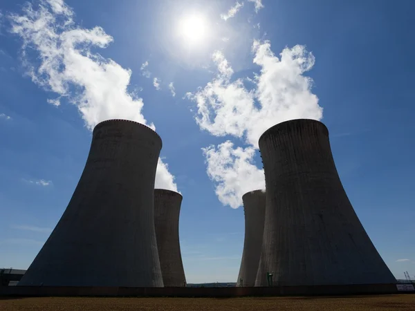 Cooling towers with contrejour lighting and beautiful sky