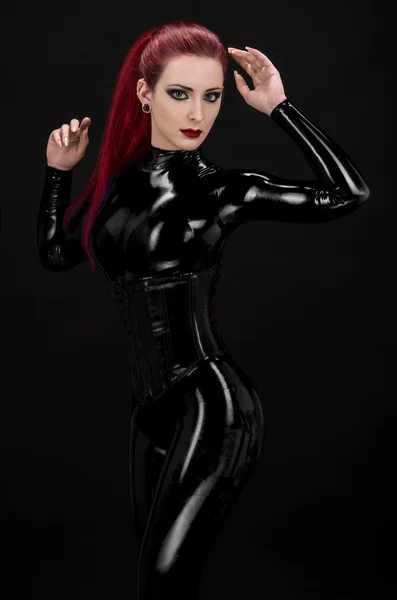 Sexy woman in black latex suit