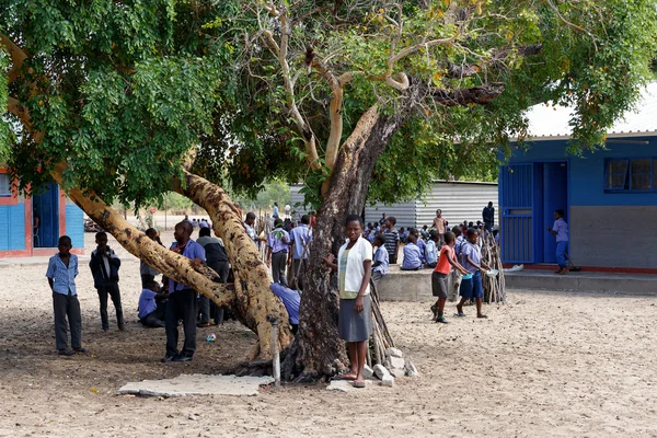 Happy Namibian school children waiting for a lesson.