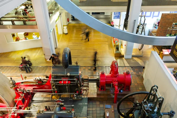 View of people walking through a museum