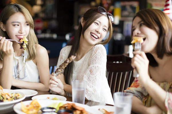 Happy young group enjoying dinner party