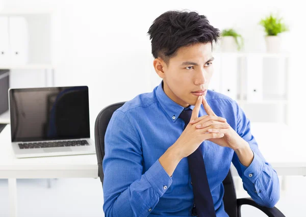 Young asian businessman  thinking plan in the office