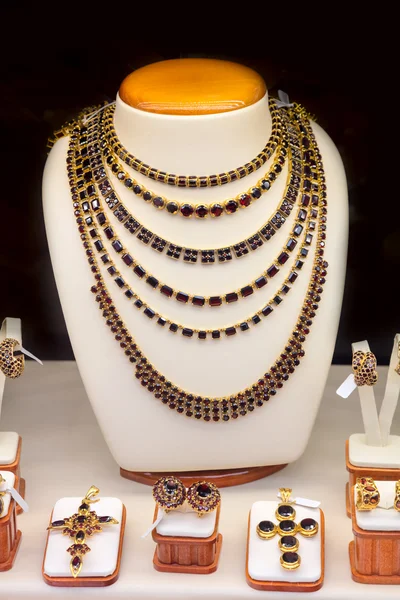 Garnet gold jewelry shop window display