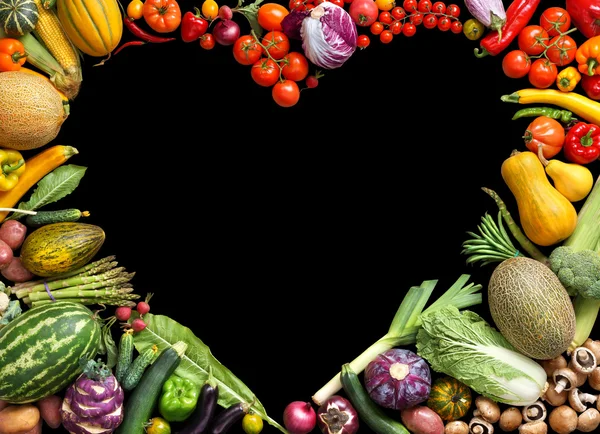 Deluxe Heart symbol. Food photography of heart made from different fruits and vegetables.