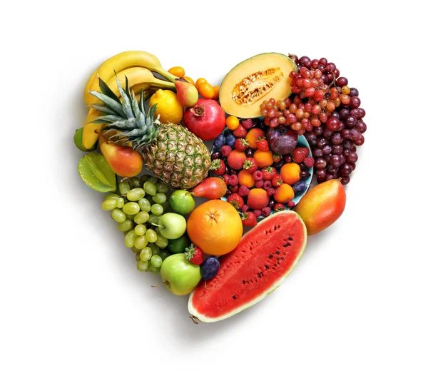 Food photography of heart made from different fruits isolated white background.