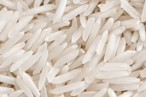 Long raw white rice background.