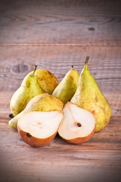Pears on wooden table.