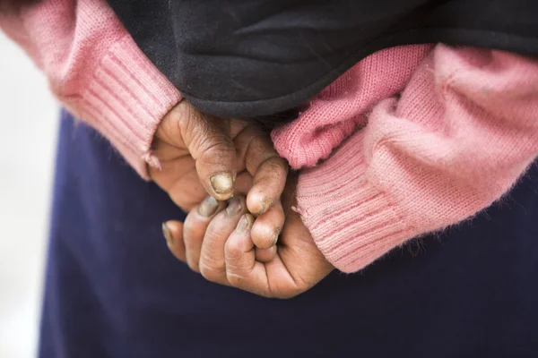 Old woman working hands, Otavalo, Ecuador