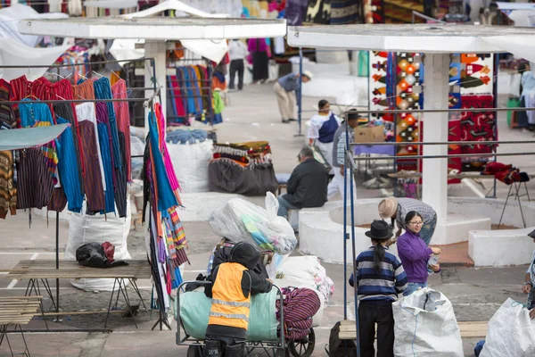 Setting up the market of Otavalo, Ecuador