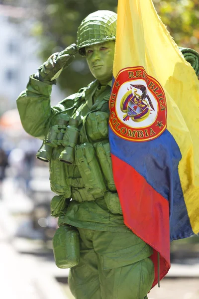 Colombian Soldier and flag in the street of Bogota