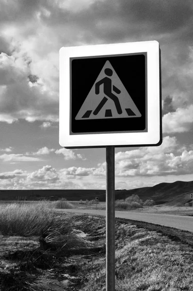 Pedestrian Crossing Sign on old desert road