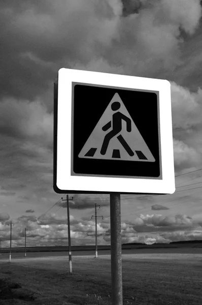 Pedestrian Crossing Sign on sky background