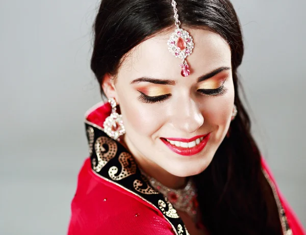 cheerful indian woman in sari
