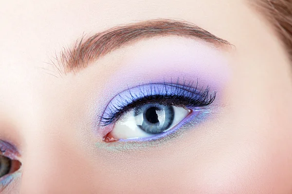 Eye make-up with bright  colors