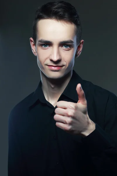 Man giving you two thumbs up