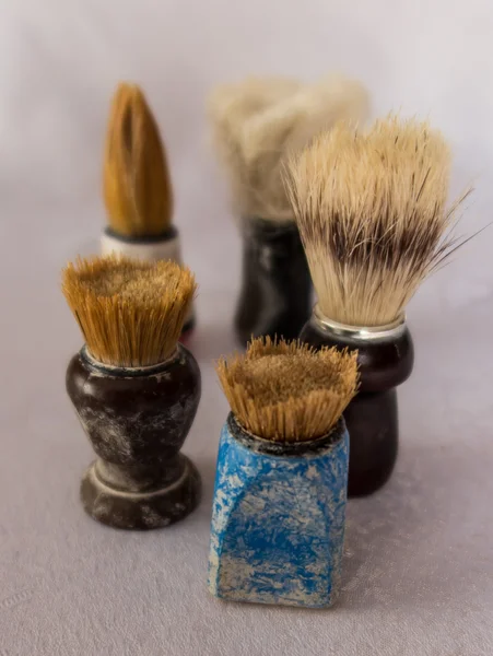 New and old shaving brush