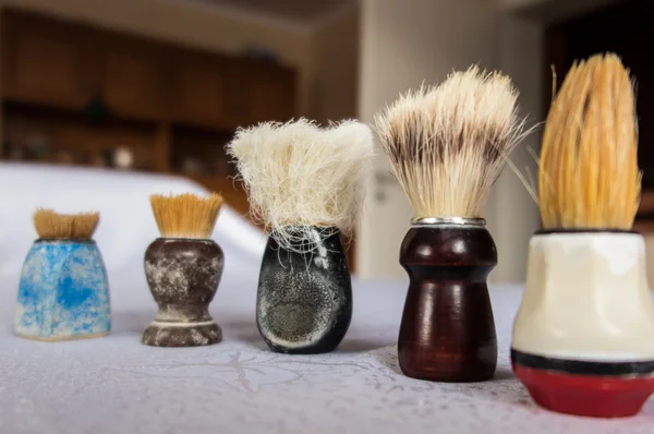New and old shaving brush