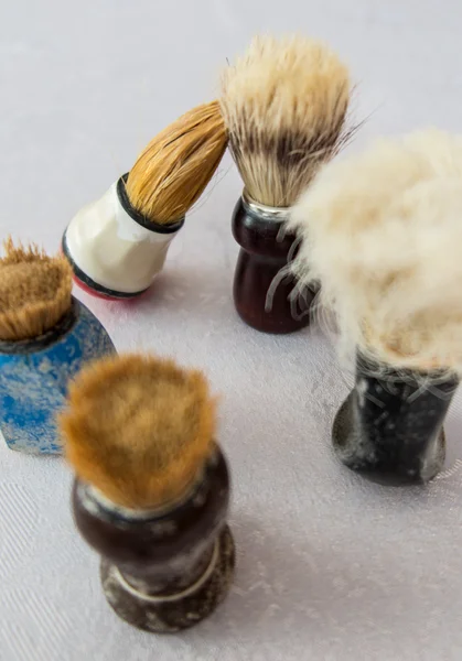 New and old shaving brush