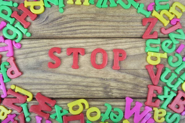 Stop on wooden table