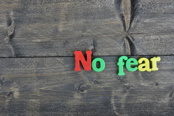No fear on wooden table