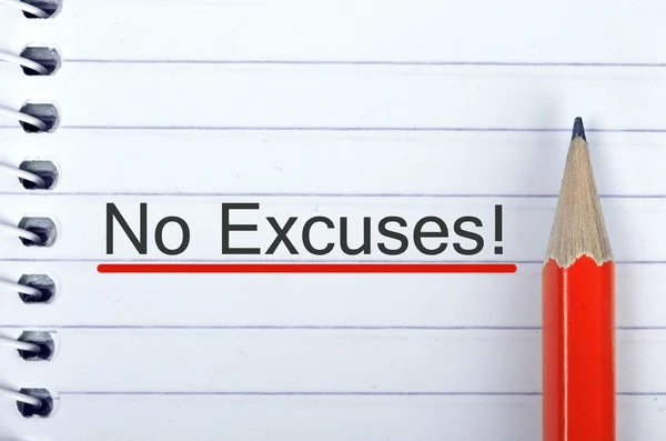 No Excuses text on notepad and pencil