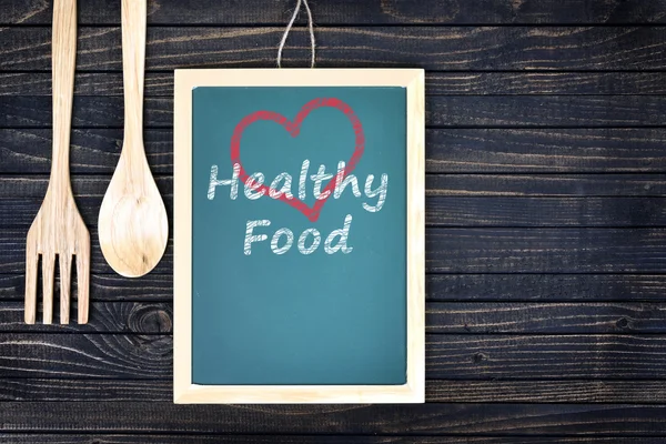 Love healthy food text on green board