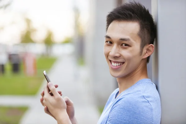 Asian man with cellphone