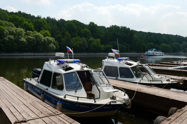 Police boats at the dock. Russian police keeps order on the waterways of the country, ensuring  safety of vacationers and preventing accidents.