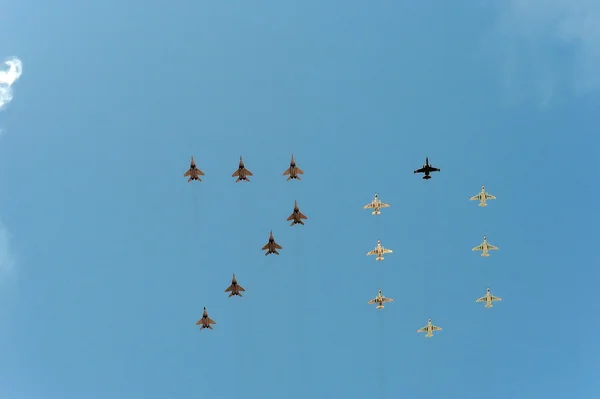Multirole fighters MiG-29 and su-25 during a military parade to commemorate the 70th anniversary of the Victory in the great Patriotic war flying the number \