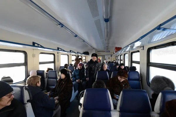 Police in the carriage commuter trains.