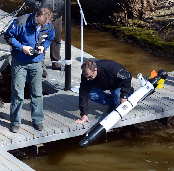 The marine scientists launch an Autonomous underwater unmanned vehicles.