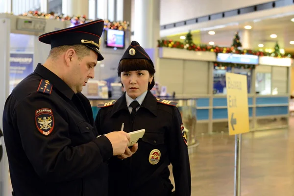 Employees of the transport police in the airport 