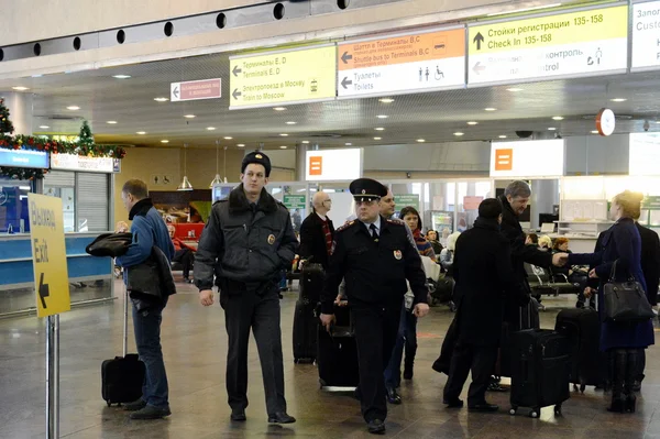 Employees of the transport police in the airport \