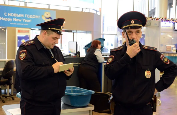 Employees of the transport police in the airport \