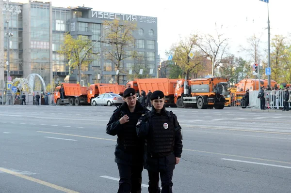 The police provide law and order during the rehearsal of the military parade on Tverskaya street in Moscow.