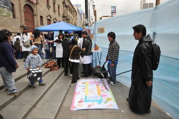 Students of medical faculty give classes to people on the street on healthy life style.